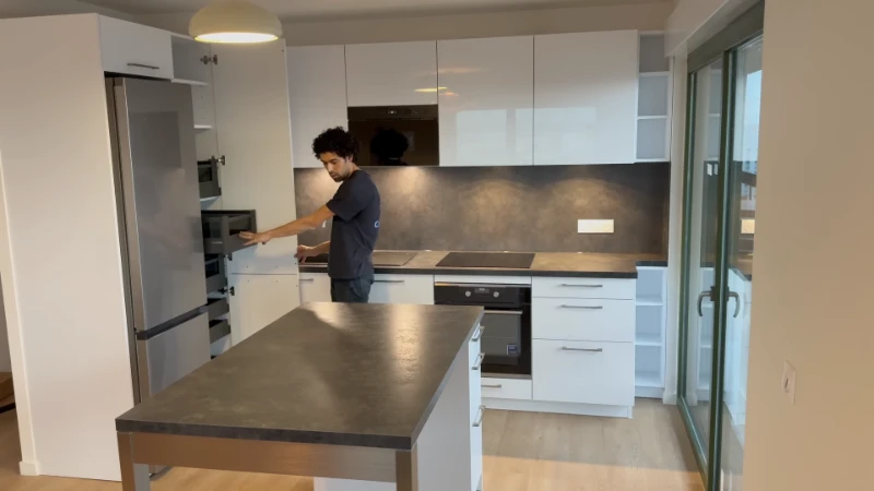 Custom kitchen cabinets and built-in storage system installed to maximize organization and available space
