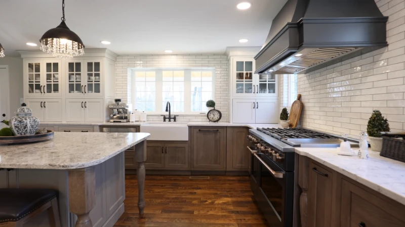 Selection of premium kitchen remodeling materials including quartz countertop samples, custom cabinetry, and tile flooring options