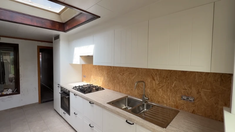 Small Portland kitchen transformation showing improved storage, lighting, and layout without increasing square footage